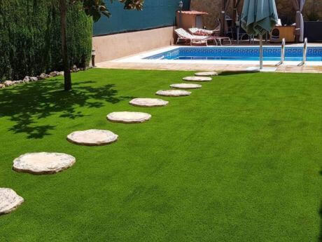 Home 2 cesped artificial jardin